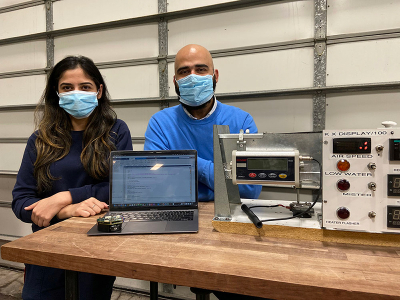 University of Illinois graduate students Ragya Kapoor, Food Science and Human Nutrition, and Amir Malvandi, Agricultural and Biological Engineering, explored how to monitor the drying process of apple chips with near-infrared spectroscopy and machine learning. Photo: College of ACES, University of Illinois.
